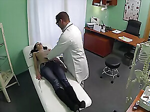 Elise gets her ass fondled and pleasured by doctors in a steamy session.